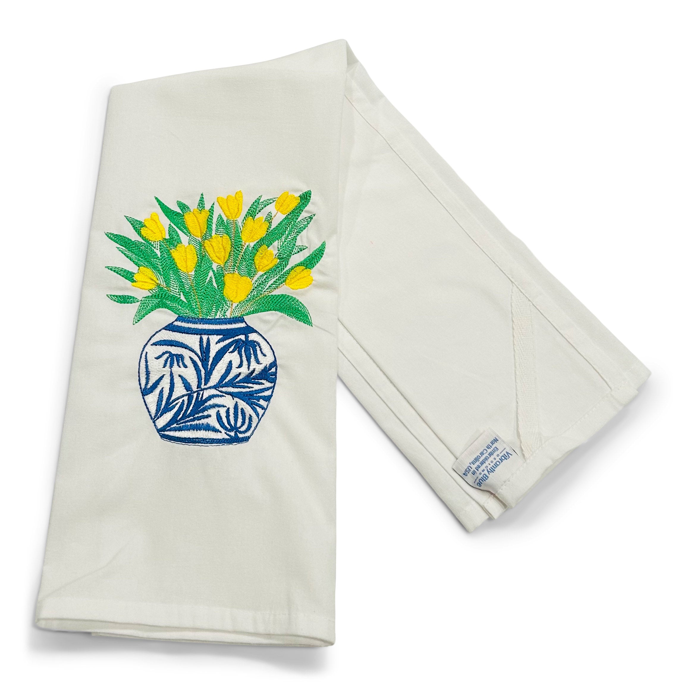 Yellow Tulips in Blue Planter on white