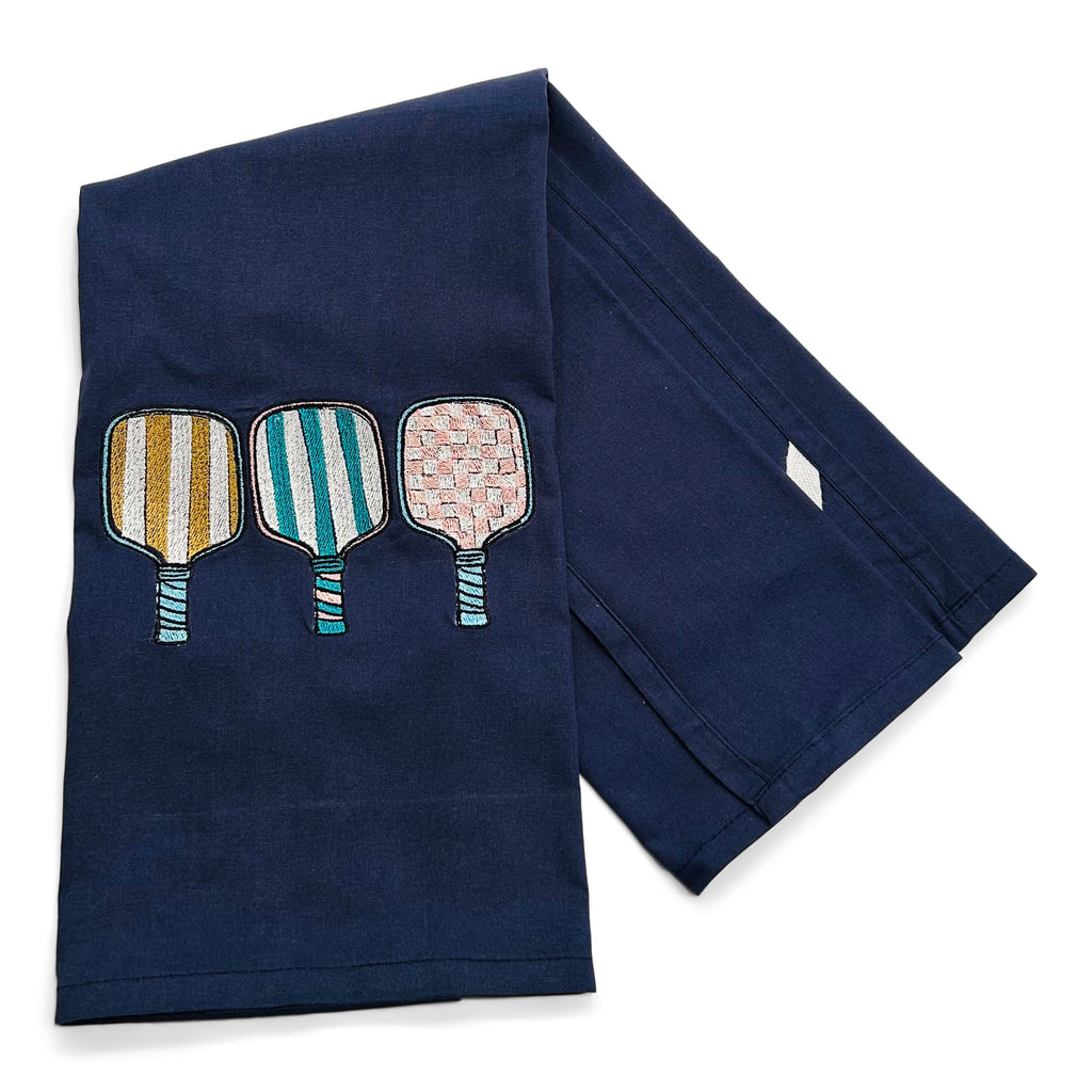 Trio of Pickleball Racquets on navy