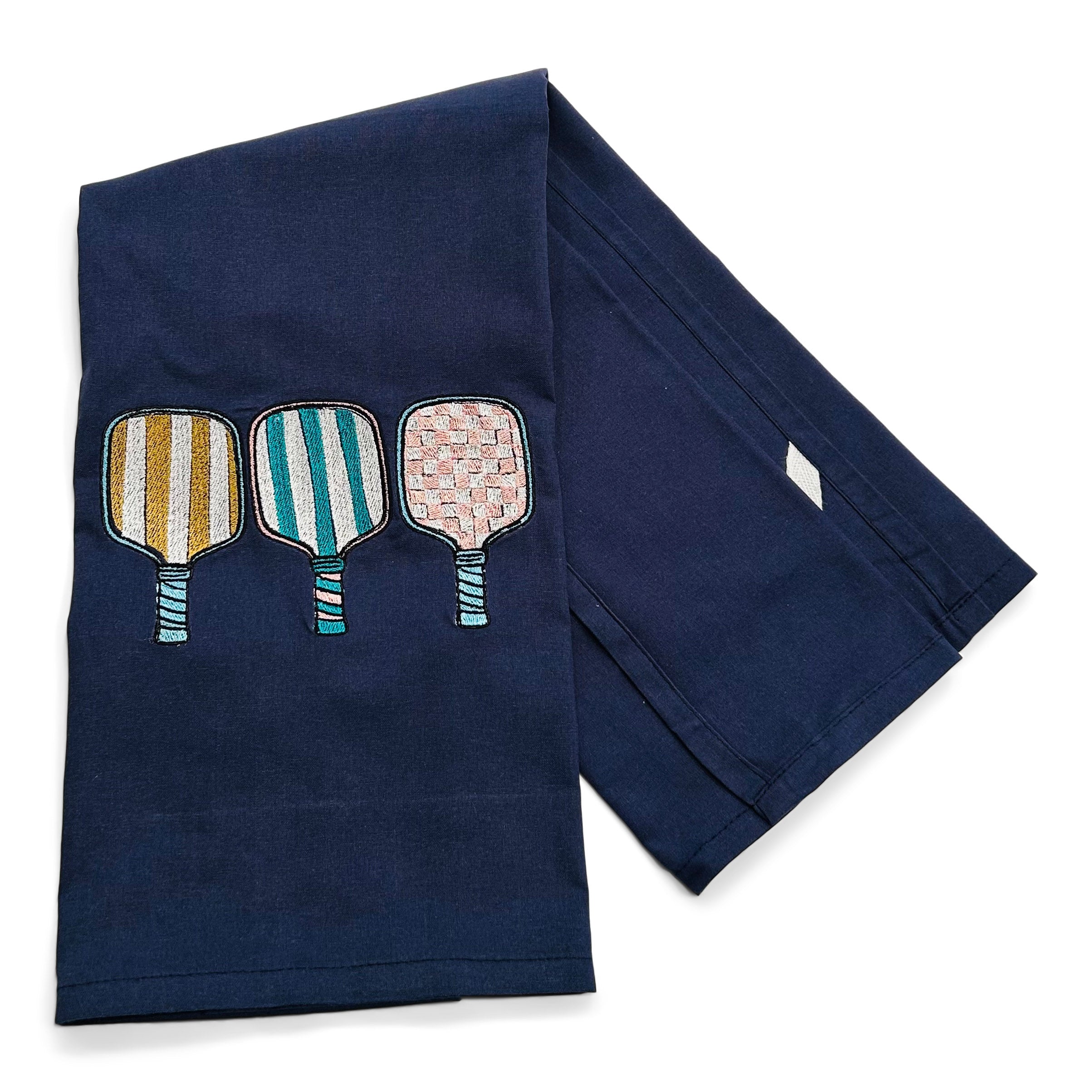 Trio of Pickleball Racquets on navy