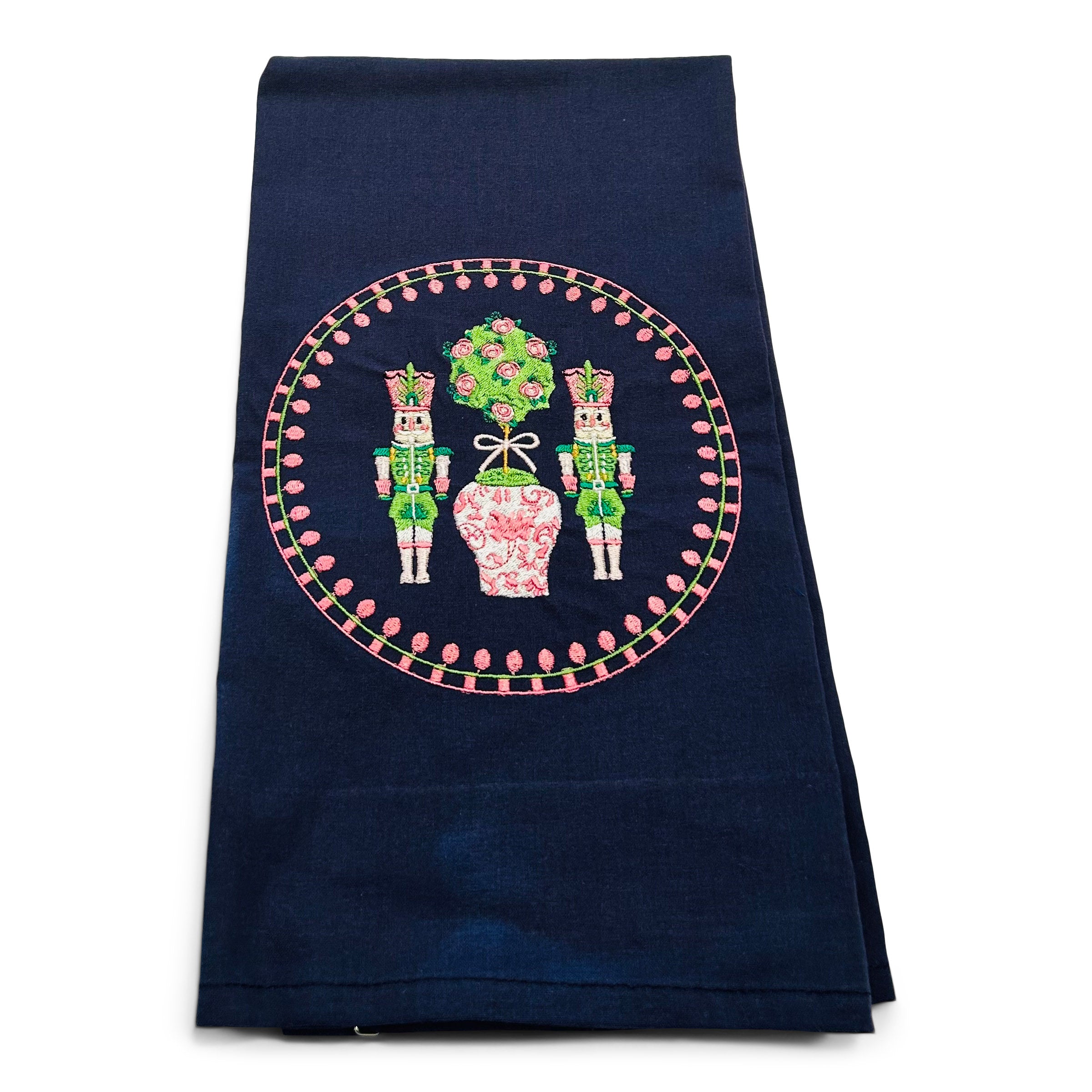 Pink Nutcrackers with Pom-Pom Trim on navy