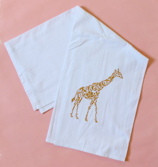 Giraffe in Gold Towel